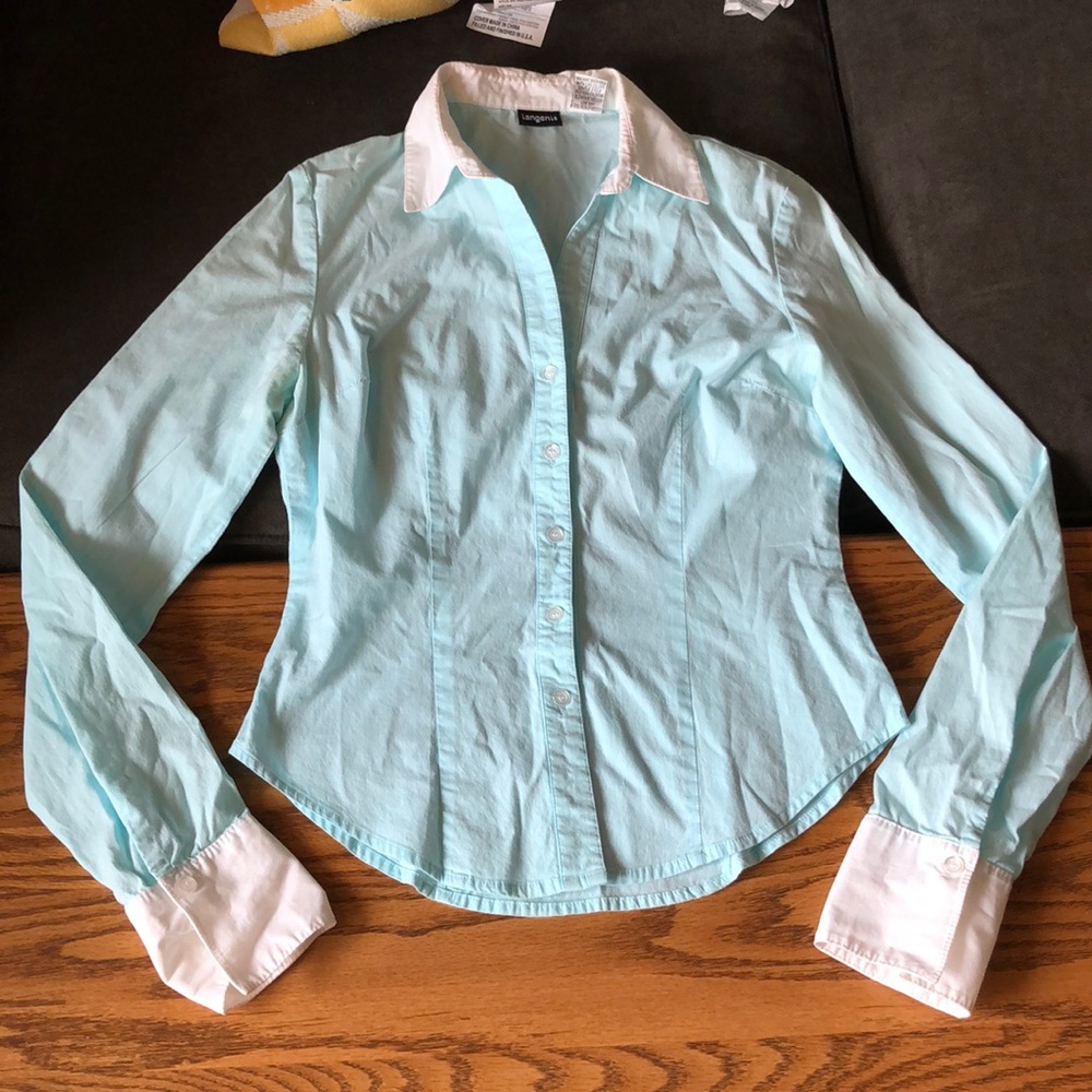 Gently worn button down blouse in light aqua color